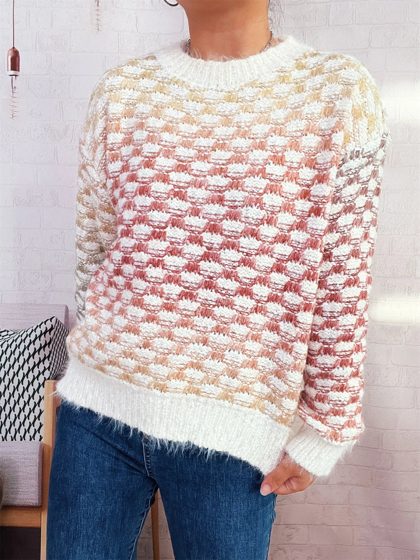 Cream and red textured knit sweater with crew neck, long sleeves, ribbed hem and cuffs