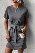Dark gray tee dress with tie waist and cuffed sleeves, decorative button placket