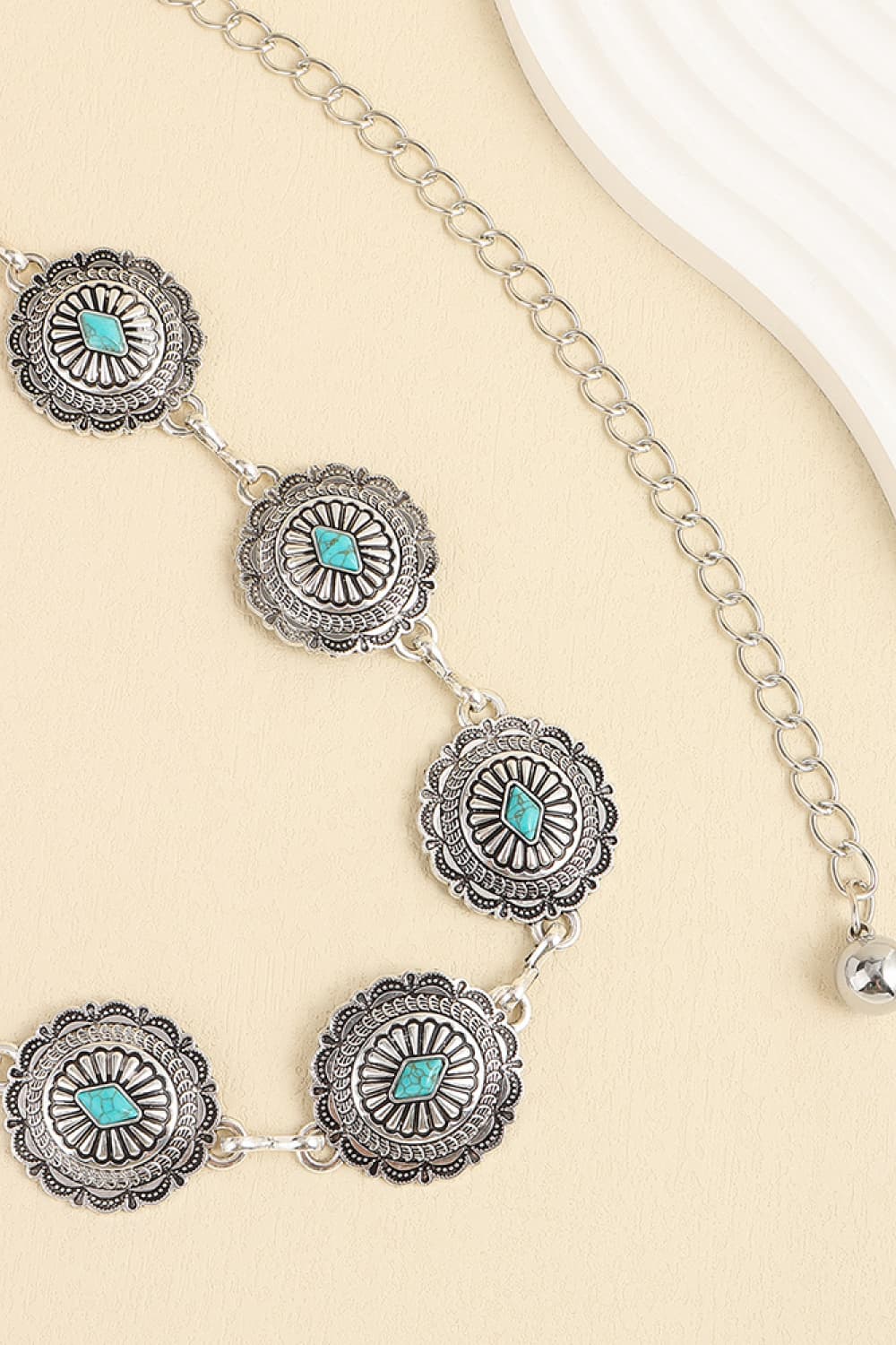 Vintage turquoise alloy belt close-up of round scalloped turquoise inlay links on chain