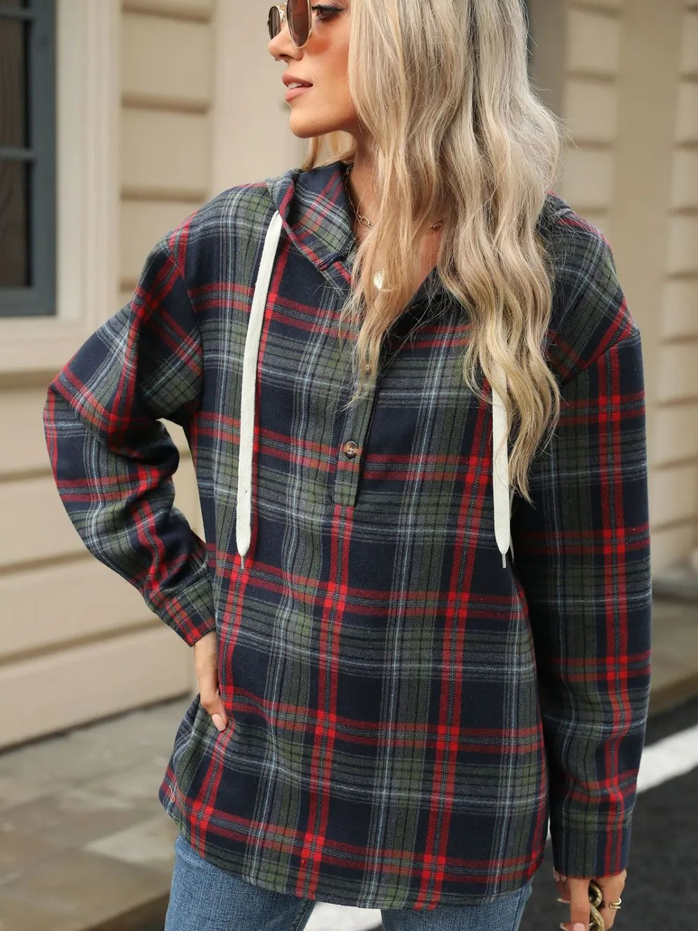 Green plaid hooded long-sleeve top with white drawstring cords