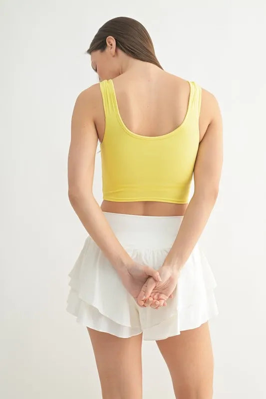 Lemon sleeveless active tank with scoop back and ruched center front