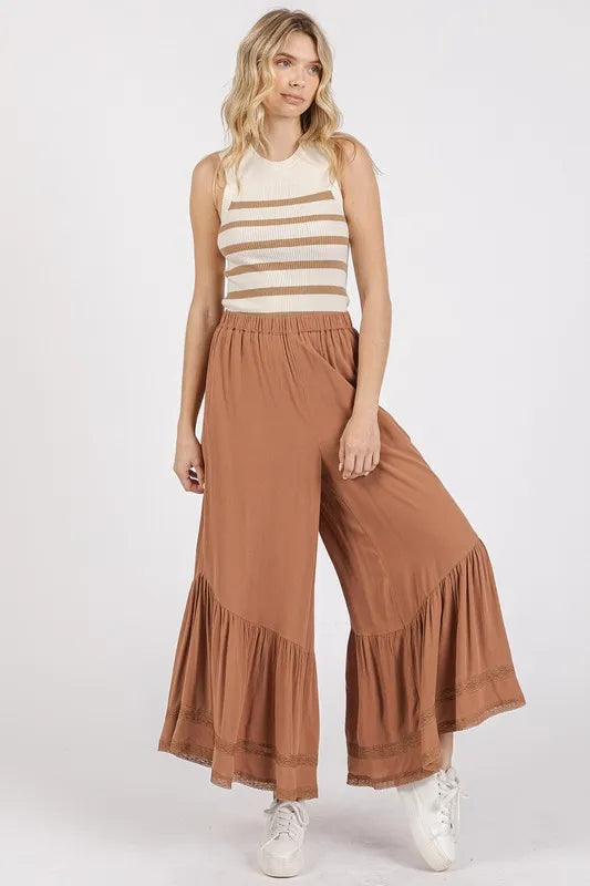 Caramel wide-leg pants with asymmetrical ruffle hem and elastic waist