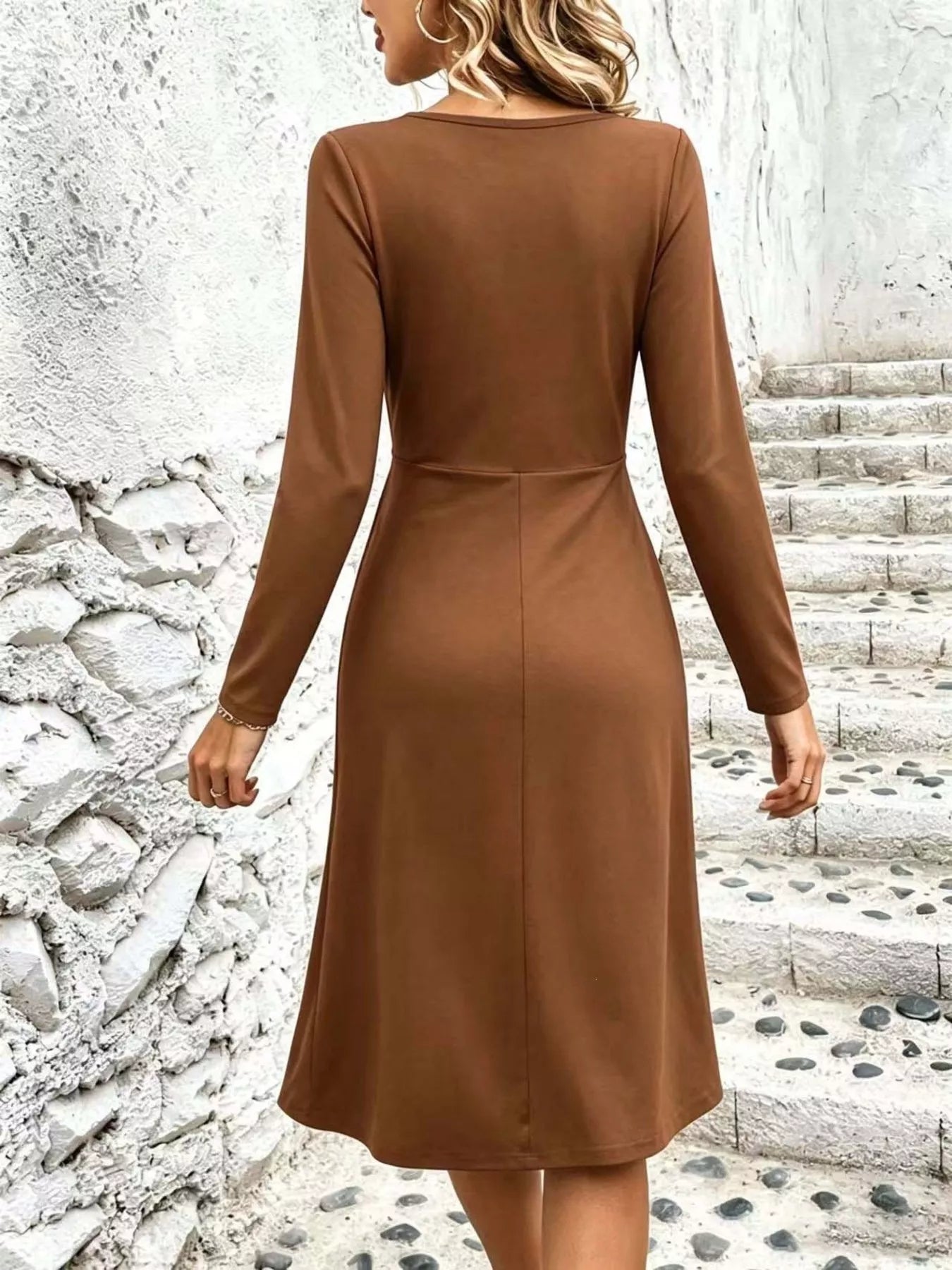 Back view brown long-sleeve midi dress with fitted waist and flared skirt