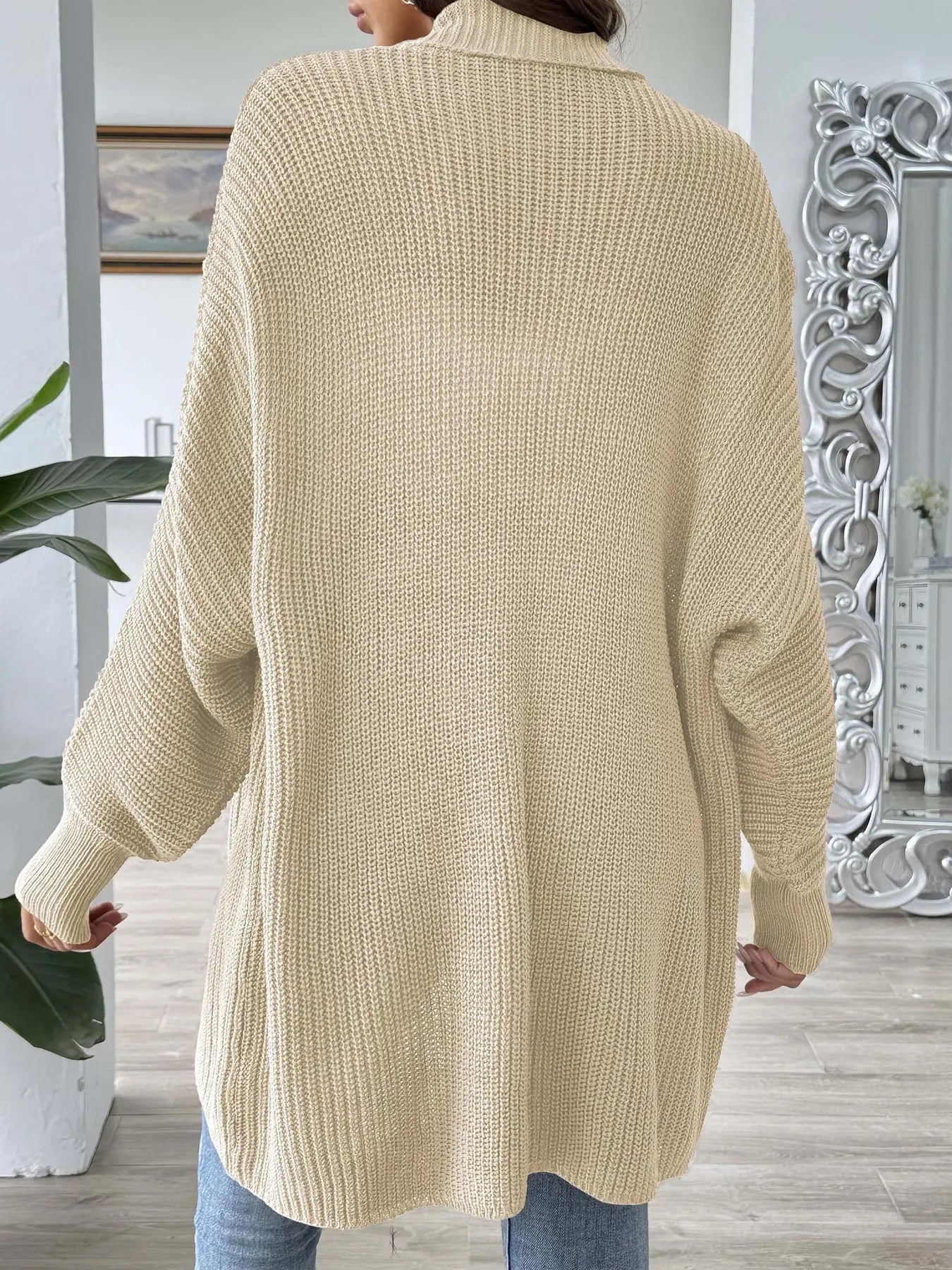 Beige open-front knit cardigan, long sleeves, back view, relaxed oversized fit