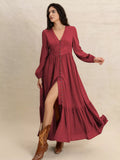 Burgundy V-neck maxi dress with button-front, long balloon sleeves, and side slit