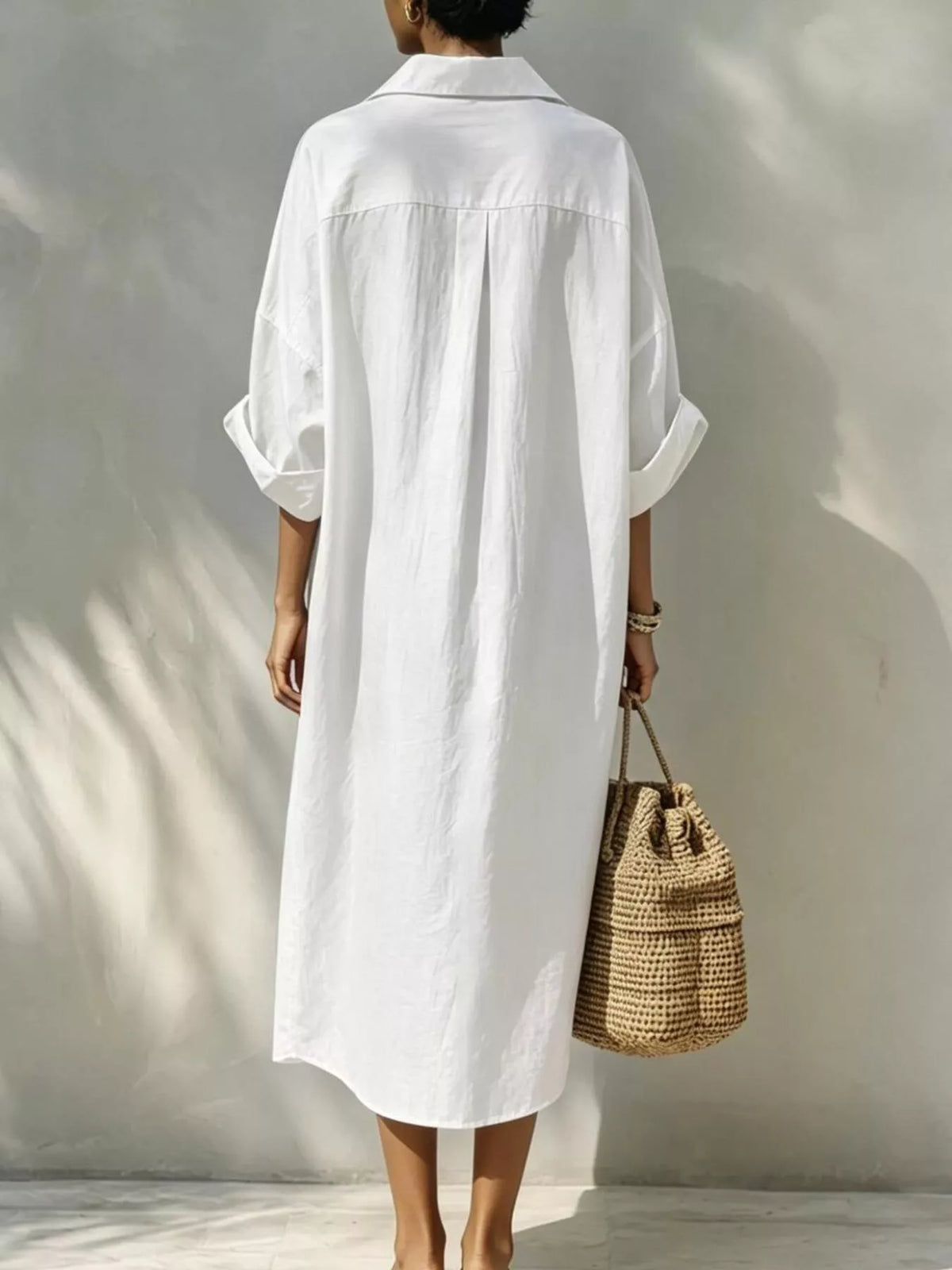 White button-front shirt dress, back view with loose gathered shoulders