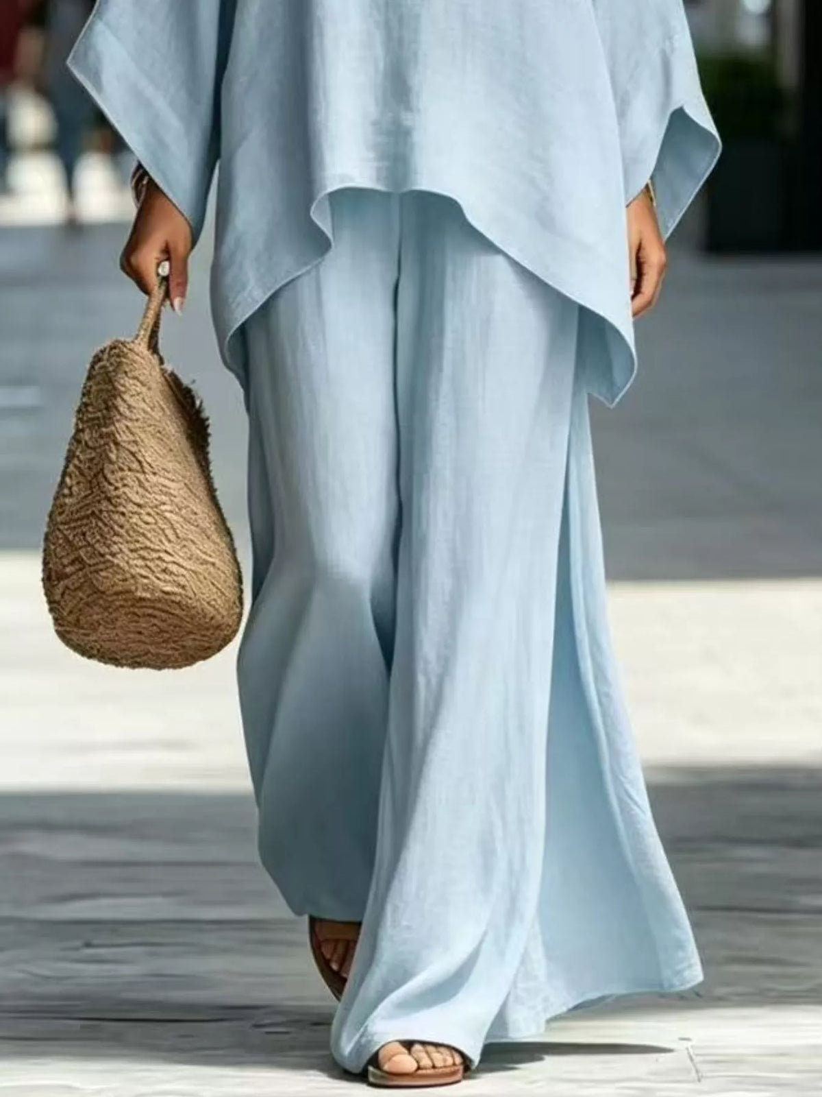 Light blue wide-leg pants with batwing tunic top set
