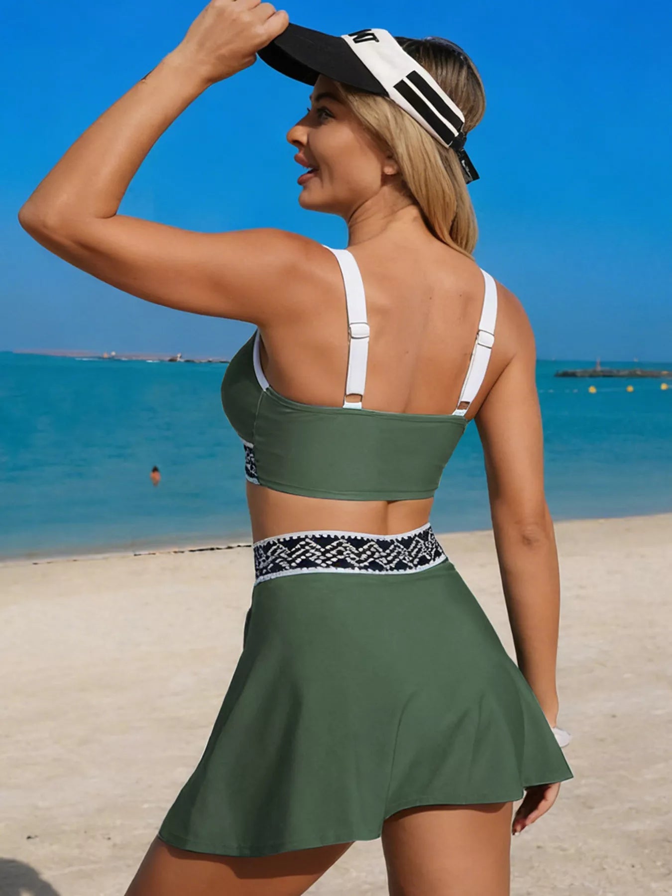 Contrast Trim Tank and Skort Swim Set in olive green with white straps, shown on a model at the beach