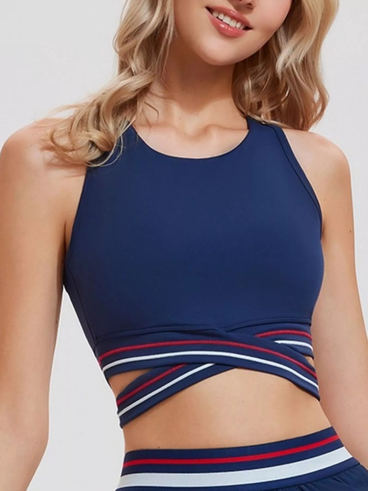 Dark navy quick-dry active tank top with criss-cross hem and striped trim