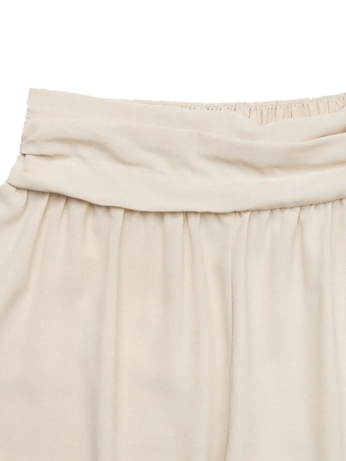 Cream elastic waistband with ruched gathering and soft pleats