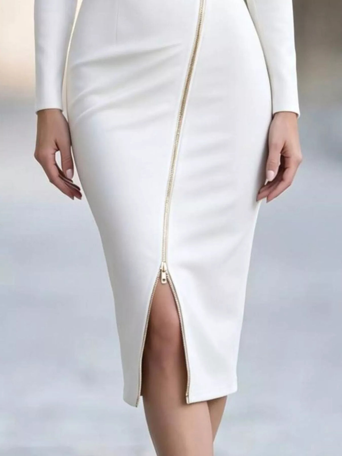 White asymmetric zipper lapel bodycon dress close-up of front slit and zipper