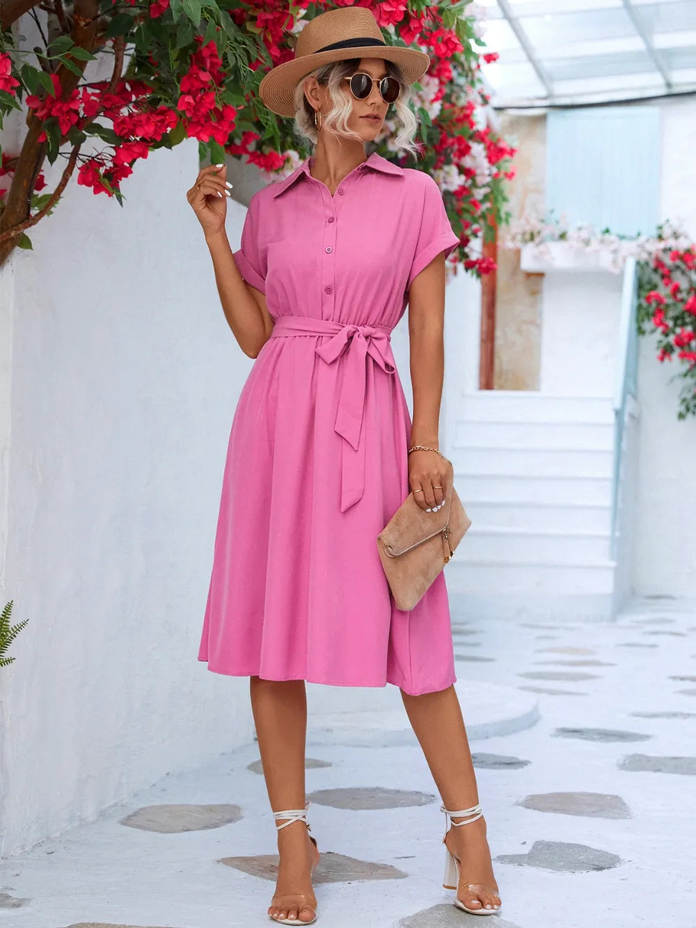 Pink buttoned short-sleeve dress with tie waist and midi skirt