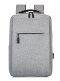 Light gray oxford backpack with top handle, dual adjustable straps, and front zip pocket.