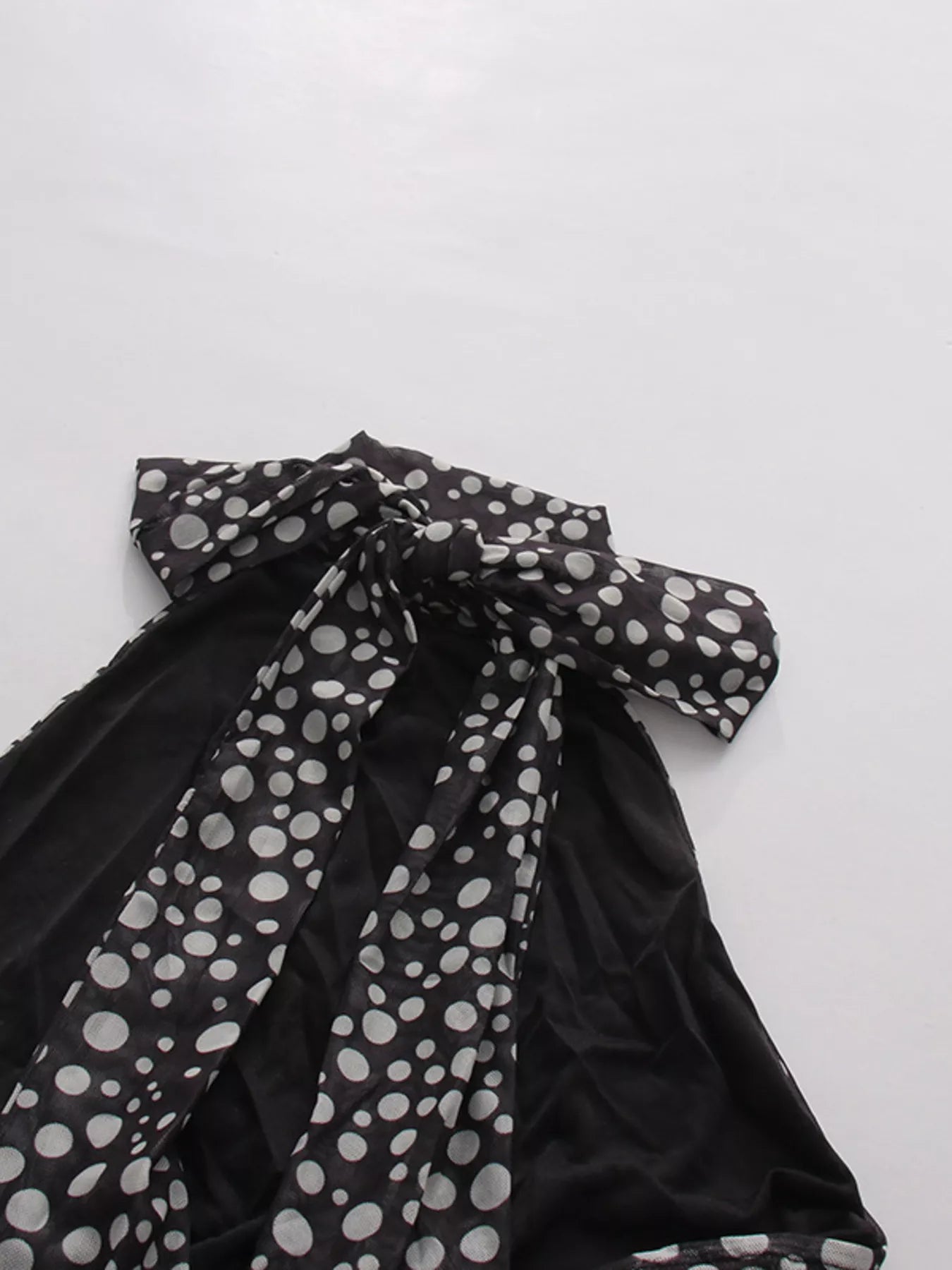 Cedar & Moore Halter Neck Polka Dot Maxi Dress in black with white polka dots, tied neck