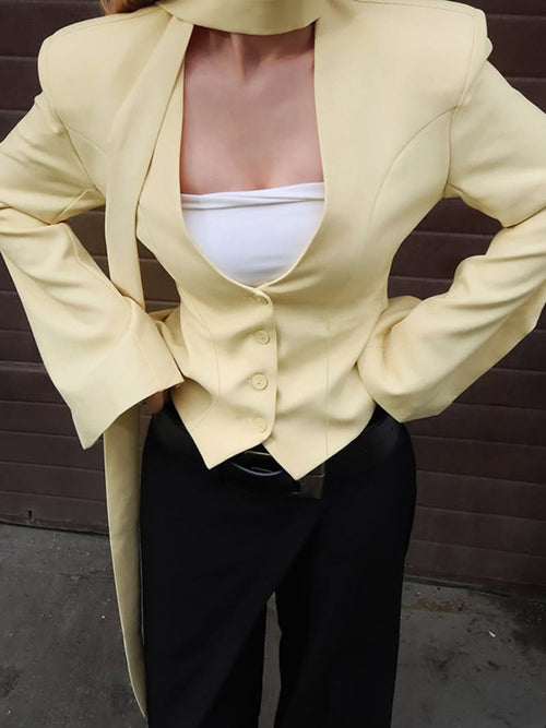 Pastel yellow button-up long-sleeve blazer with notched lapel and front buttons