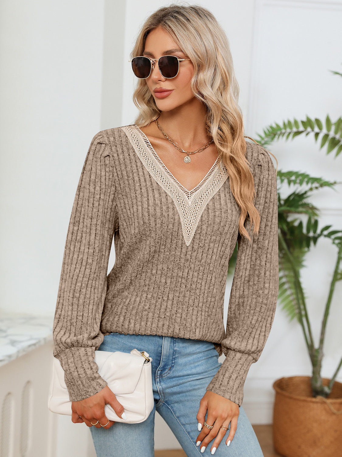 Khaki ribbed blouse with lace V-neck trim and long sleeves
