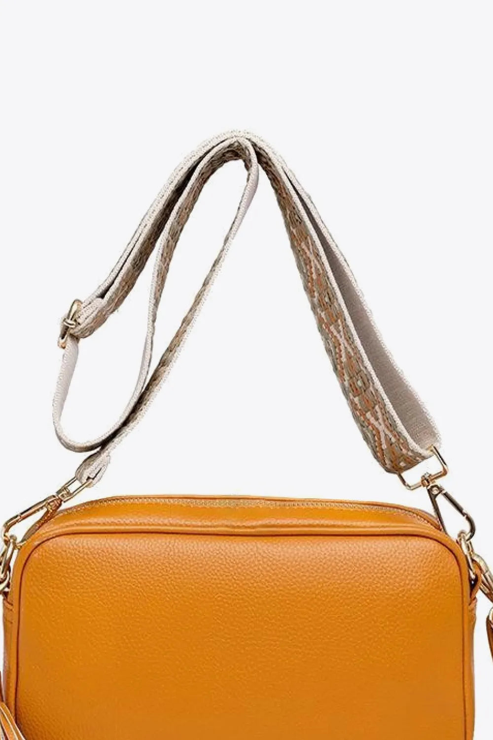 PU leather tassel crossbody bag, orange front close-up with zip top and gold-tone rings