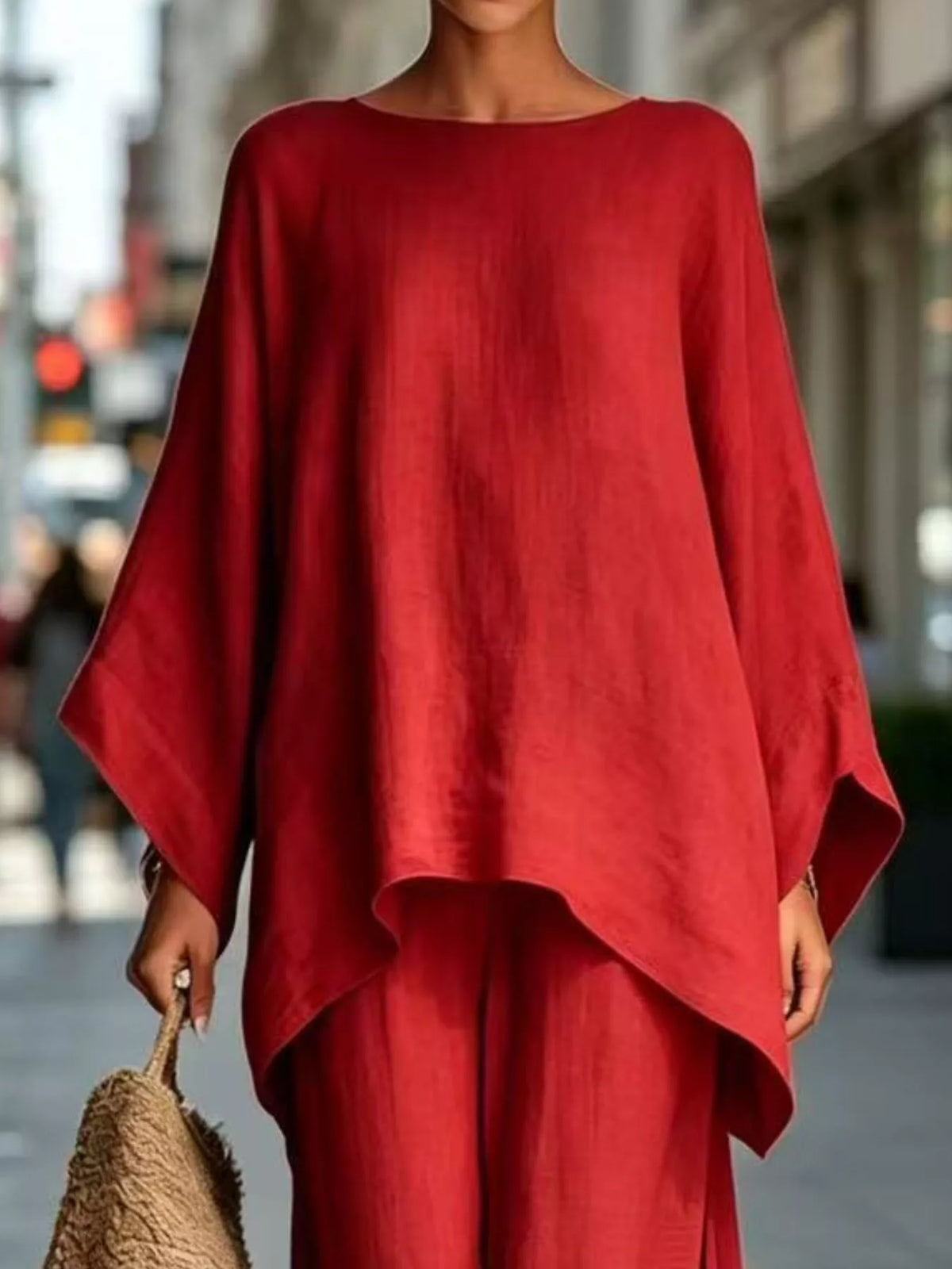 Red batwing tunic top with flowing wide-leg pants