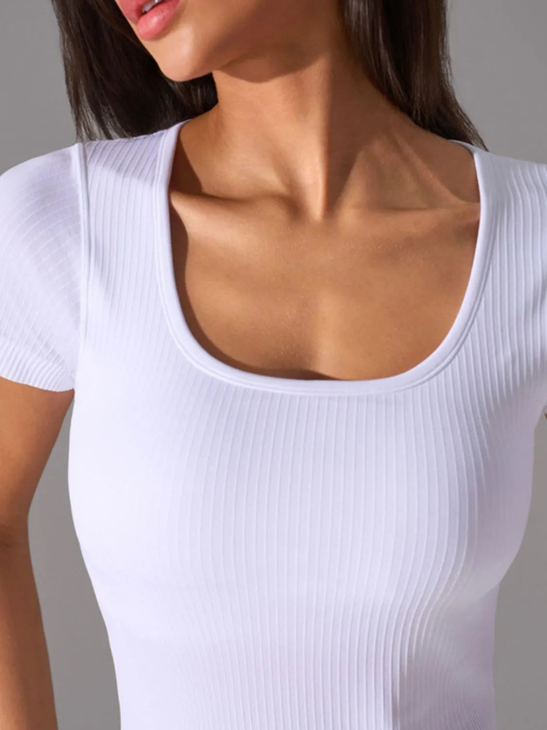 White square-neck active t-shirt neckline detail with fitted ribbed knit