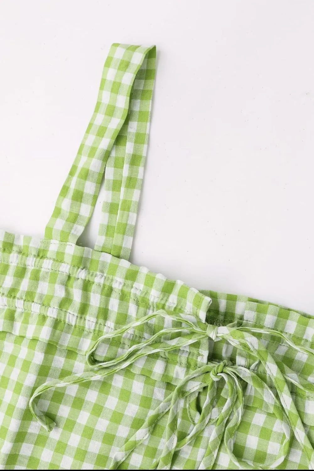 Green gingham tie-front detail with gathered ruffle trim