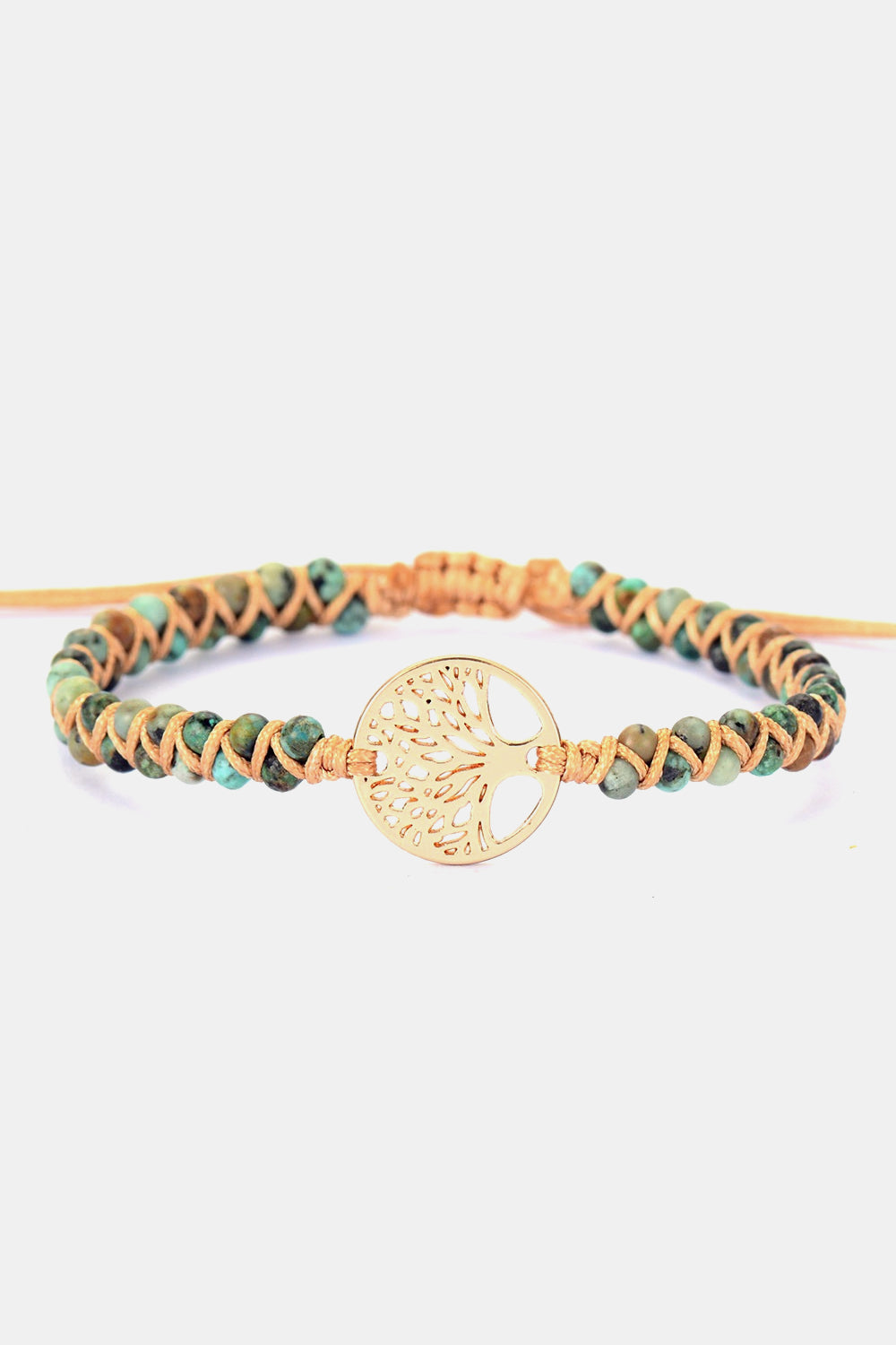 Handmade beaded bracelet with braided turquoise and orange cord, round gold tree pendant