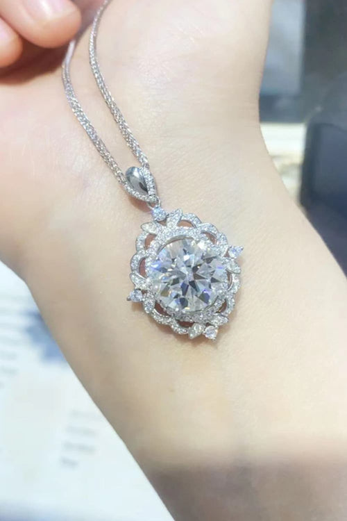 Sterling silver moissanite pendant necklace with large round halo pendant on chain