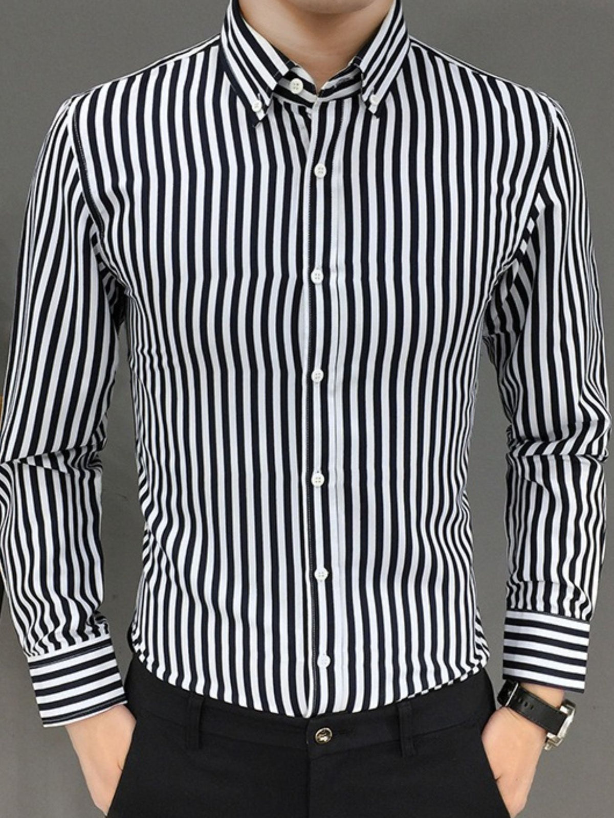 Men's black-and-white striped button-up long-sleeve shirt, collared with button placket.