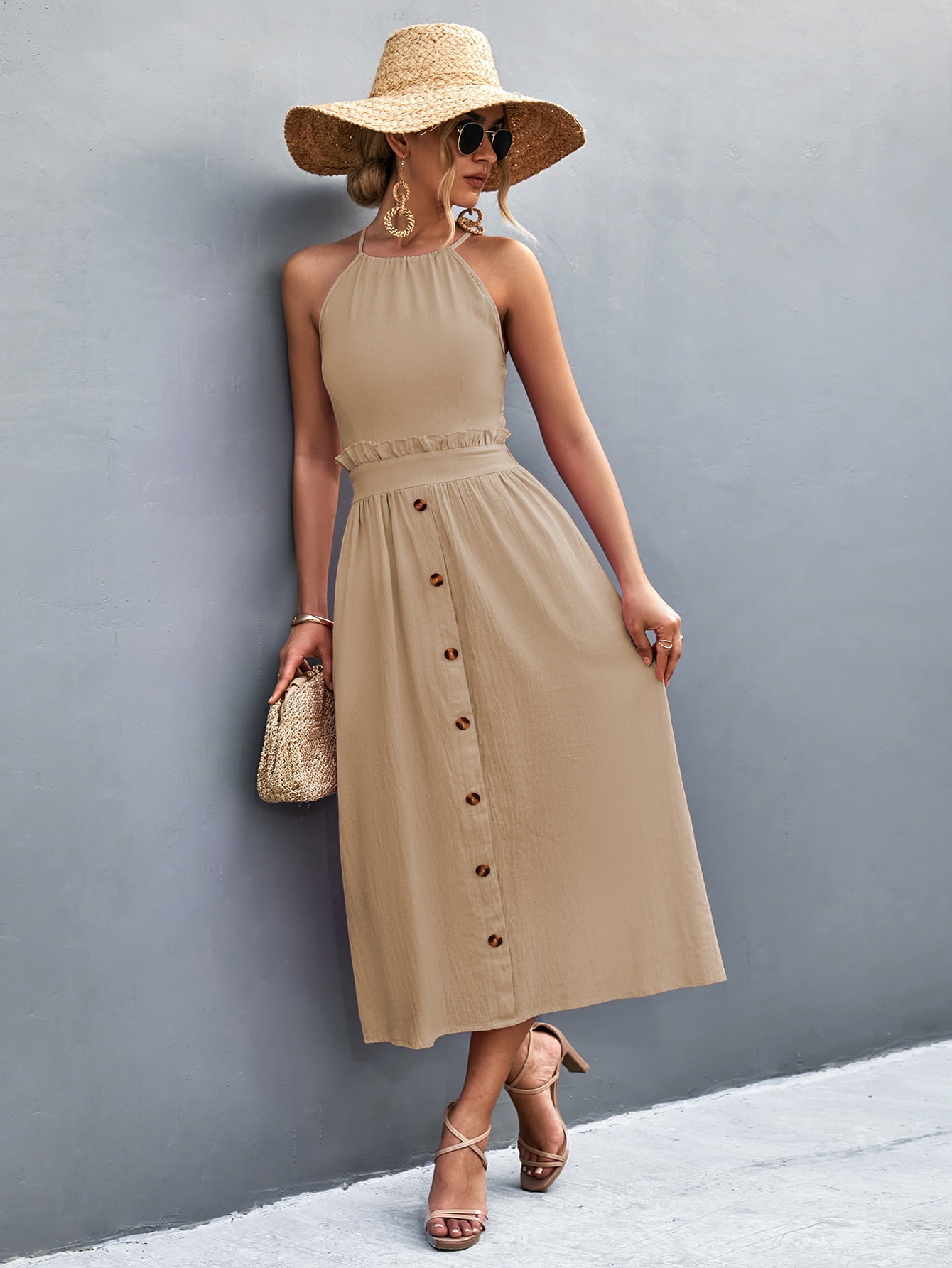 Khaki halter neck midi dress with frill trim and buttoned center front.