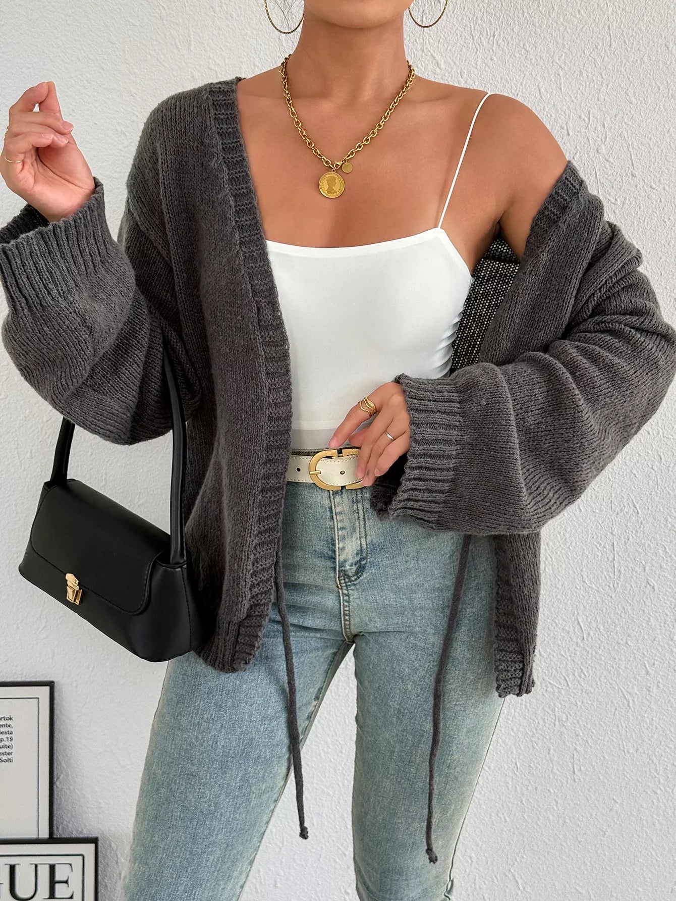 Dark gray tie-front cardigan with dropped shoulders and open V-neck front