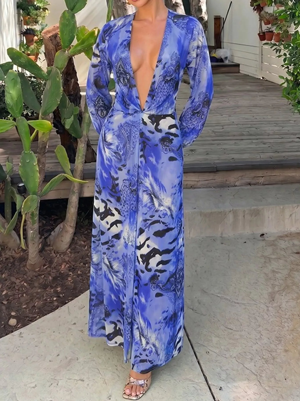 Blue printed maxi dress with deep V-neck and long sleeves