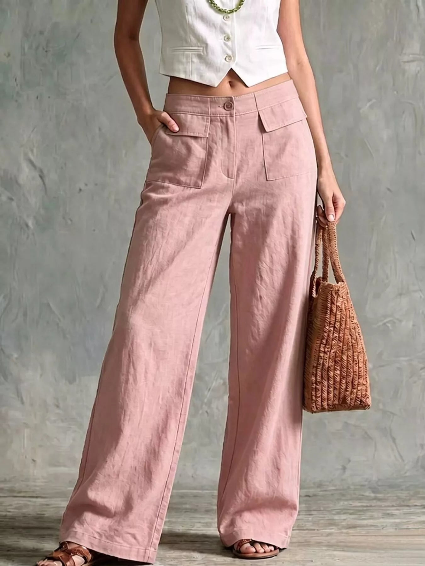 Pink wide-leg pants with front pockets and elastic waistband