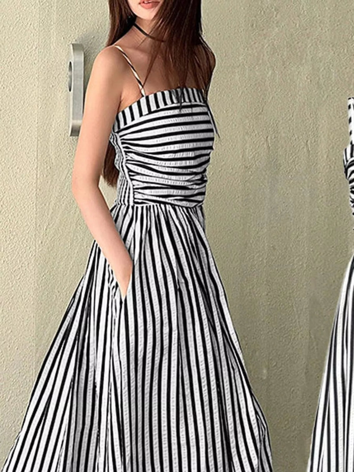 Ruched bodice sleeveless maxi dress with black-and-white vertical stripes