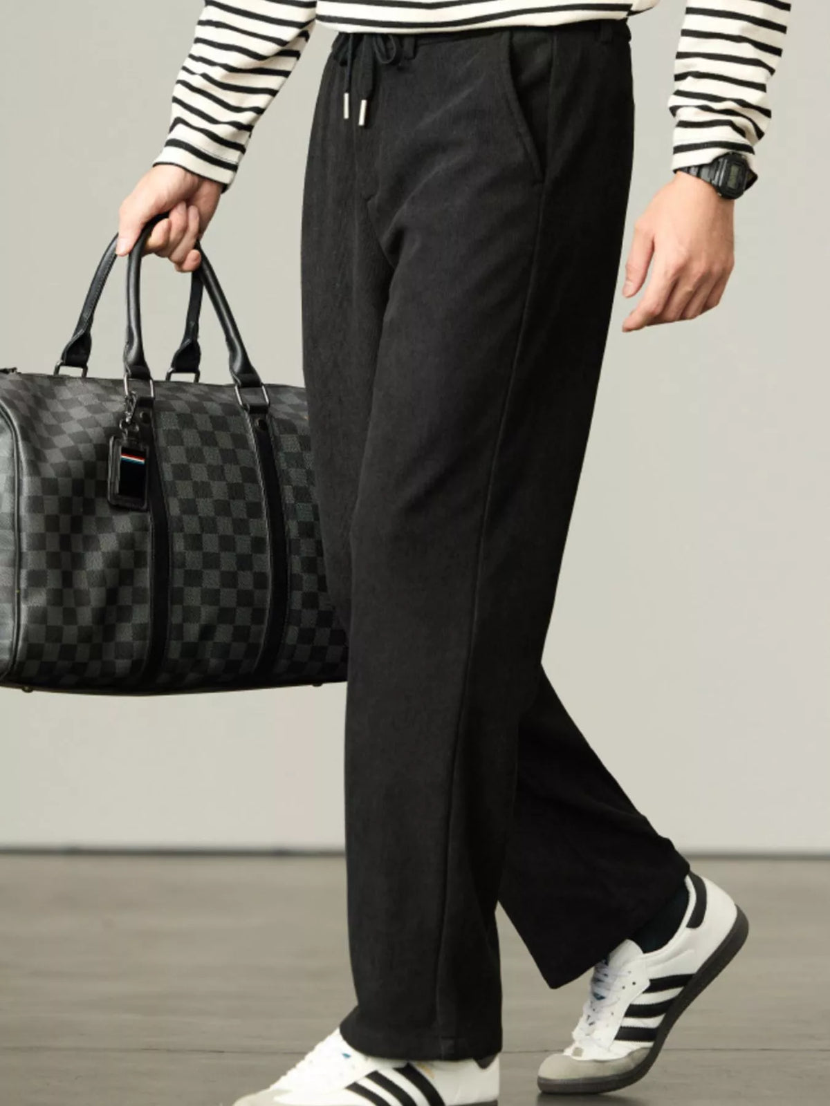 Black corduroy drawstring relaxed-fit pants with straight legs