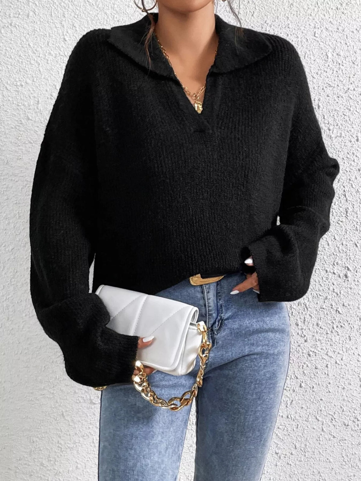 Black ribbed-knit dropped-shoulder sweater with collared V-neck pullover