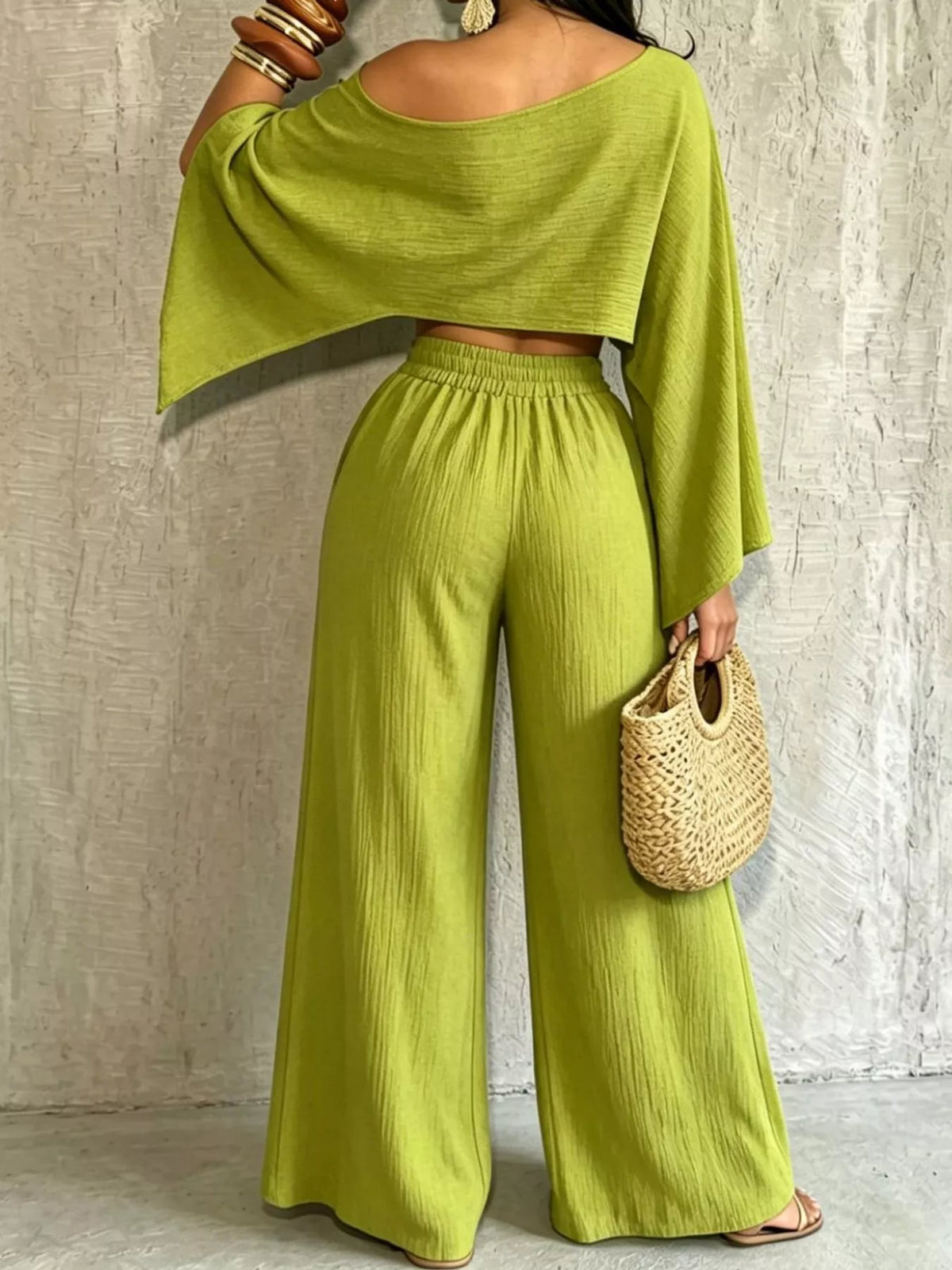 Green boat-neck crop top and wide-leg pants set, elastic waistband and flowing sleeves