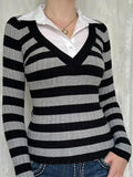 Black and white striped knit long-sleeve top with contrast V-neck and white button collar