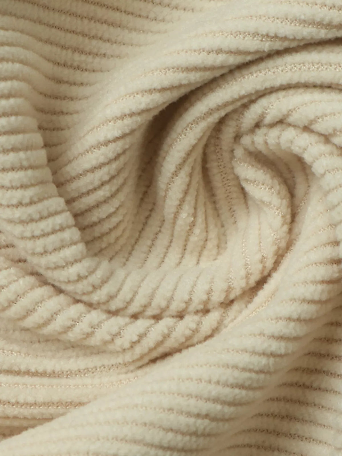 Khaki pleated midi skirt fabric close-up with ribbed texture