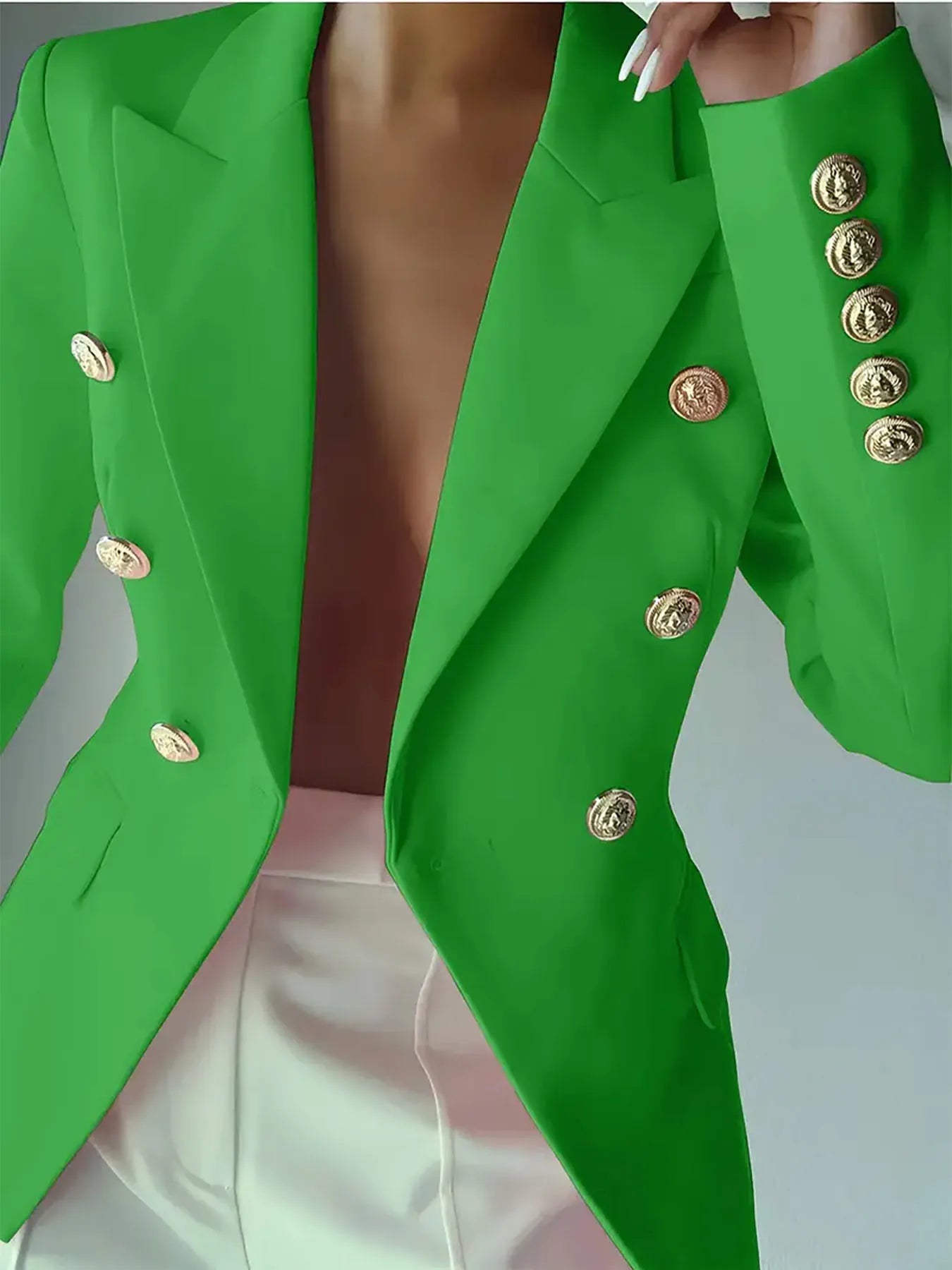 Green lapel blazer with gold-tone decorative buttons, single-breast front and cuff accents