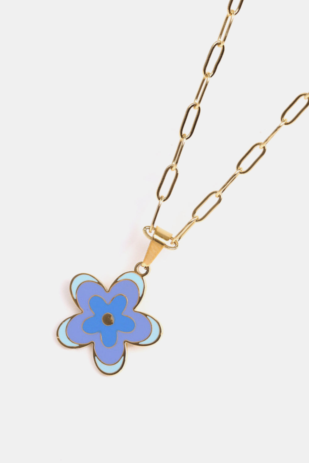 Gold-tone flower pendant necklace with blue enamel flower charm on long chain