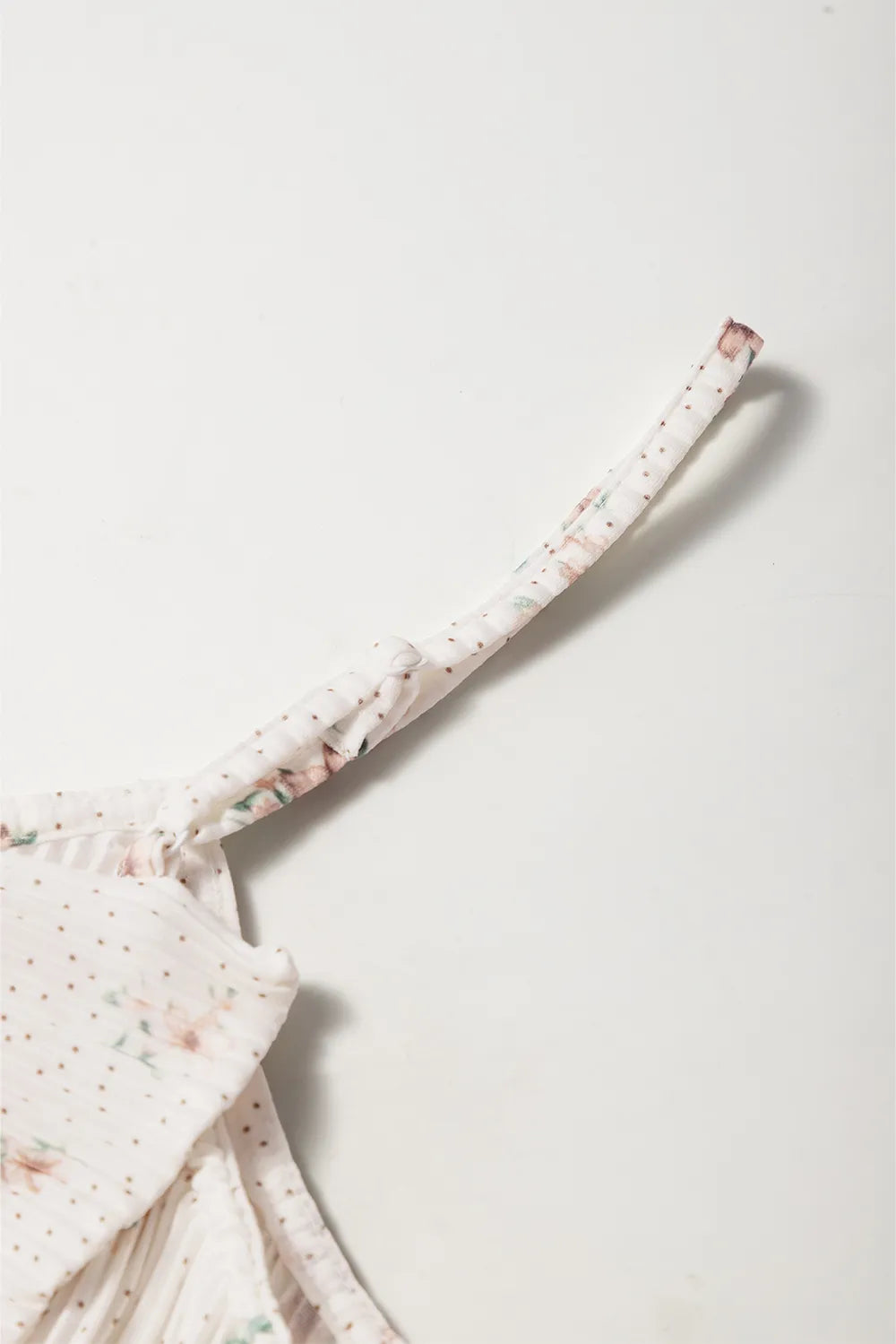 Bow-back cami strap detail, white with small floral print