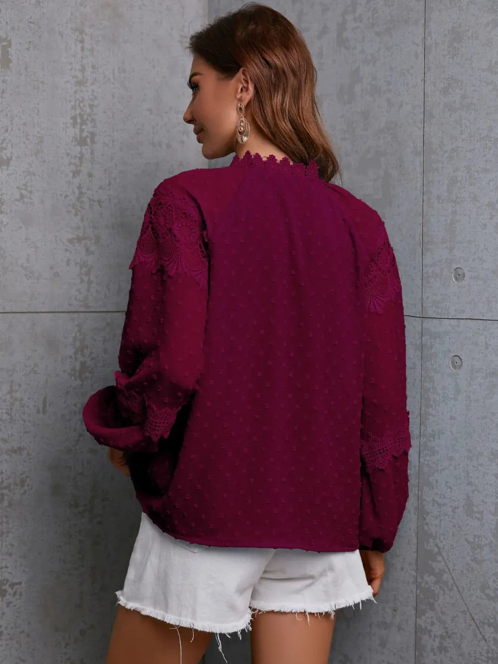 Wine crochet blouse, back view, long sleeves with textured cuffs