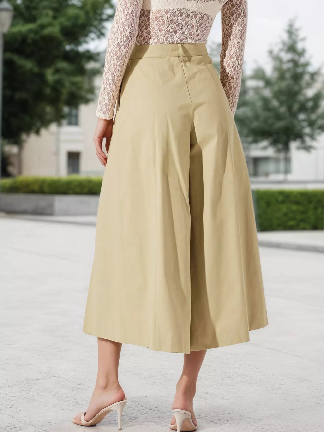 Khaki high-waisted pleated wide-leg cropped pants with roomy, draped wide legs