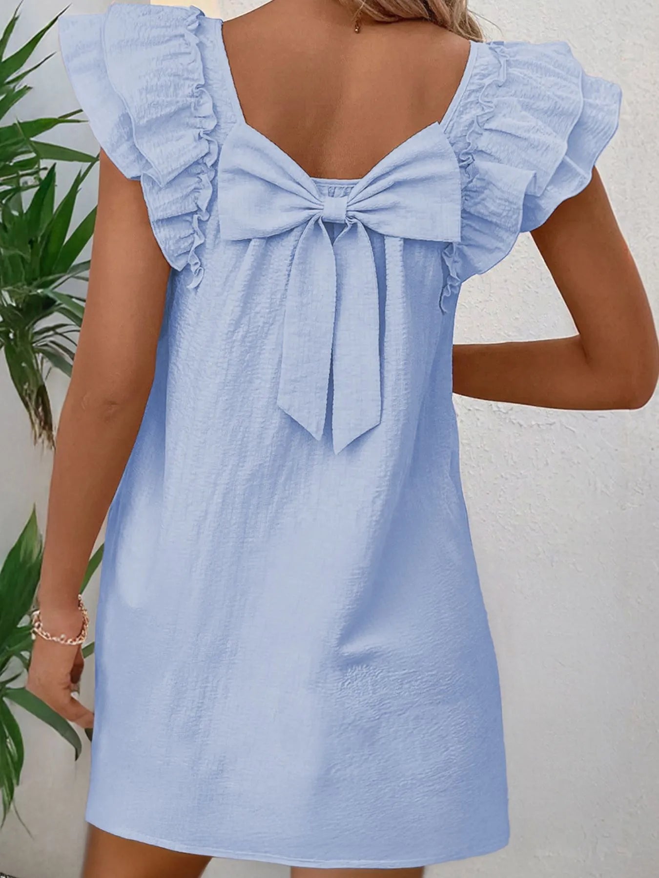 Bow Back Ruffled Sleeve Dress by Trendsi, light blue with bow-back detail and ruffles