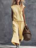 Light yellow sleeveless crew neck top and wide-leg crop pants set with drawstring waist
