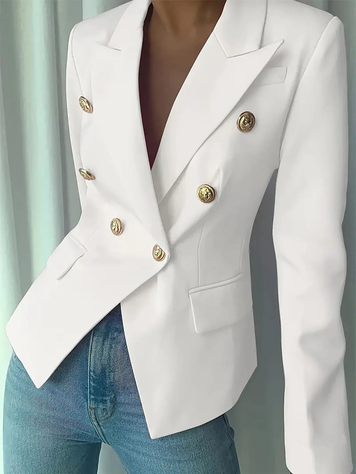 White double-breasted lapel blazer with gold buttons and single-button flap details