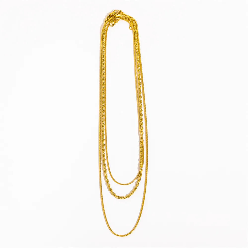Gold-plated three-layer chain necklace displayed vertically