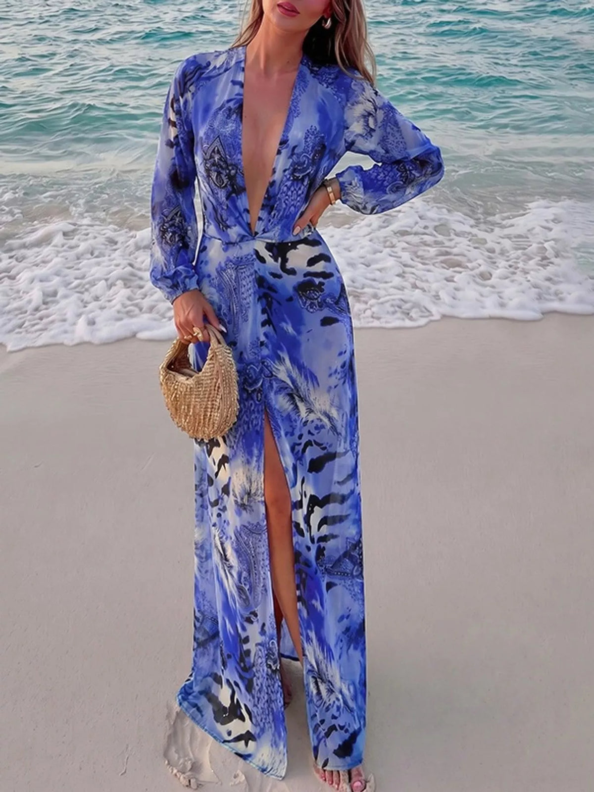 Blue printed maxi dress with deep V-neck and long flowy sleeves