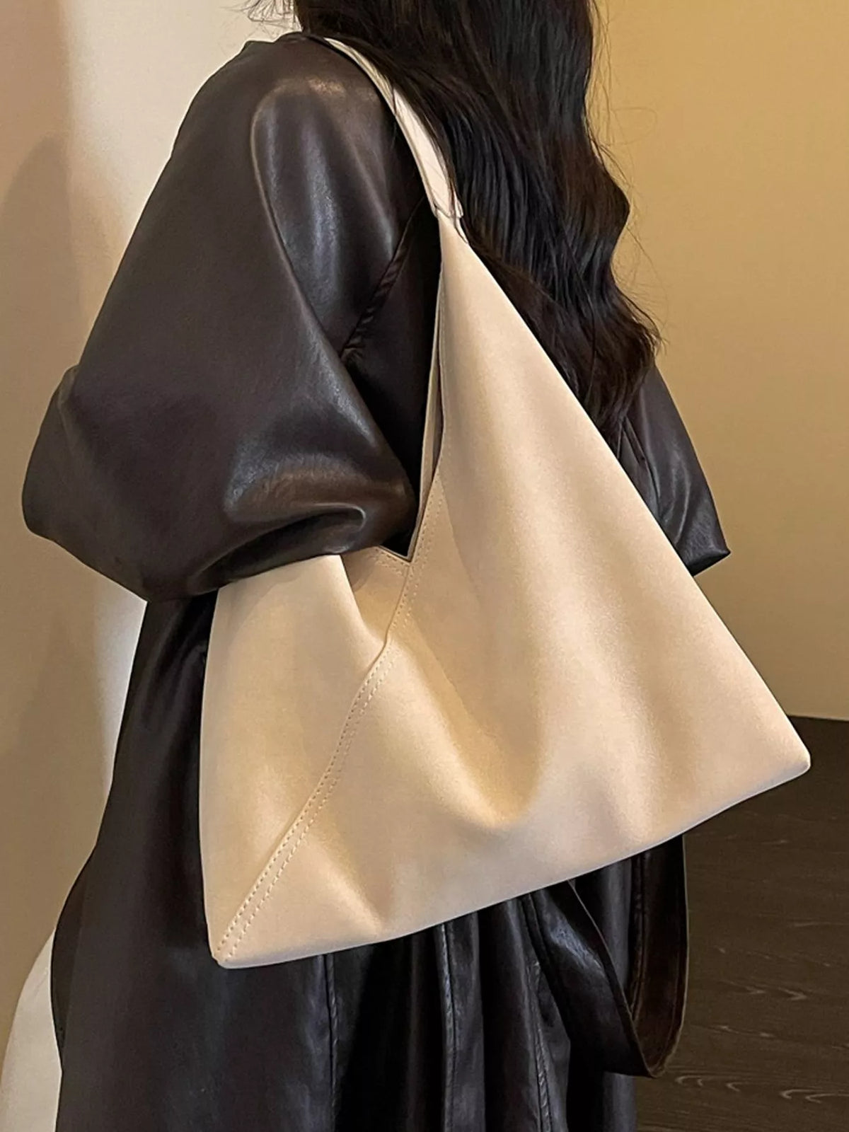 Large slouchy suede shoulder bag, off-white, soft hobo style with shoulder strap.