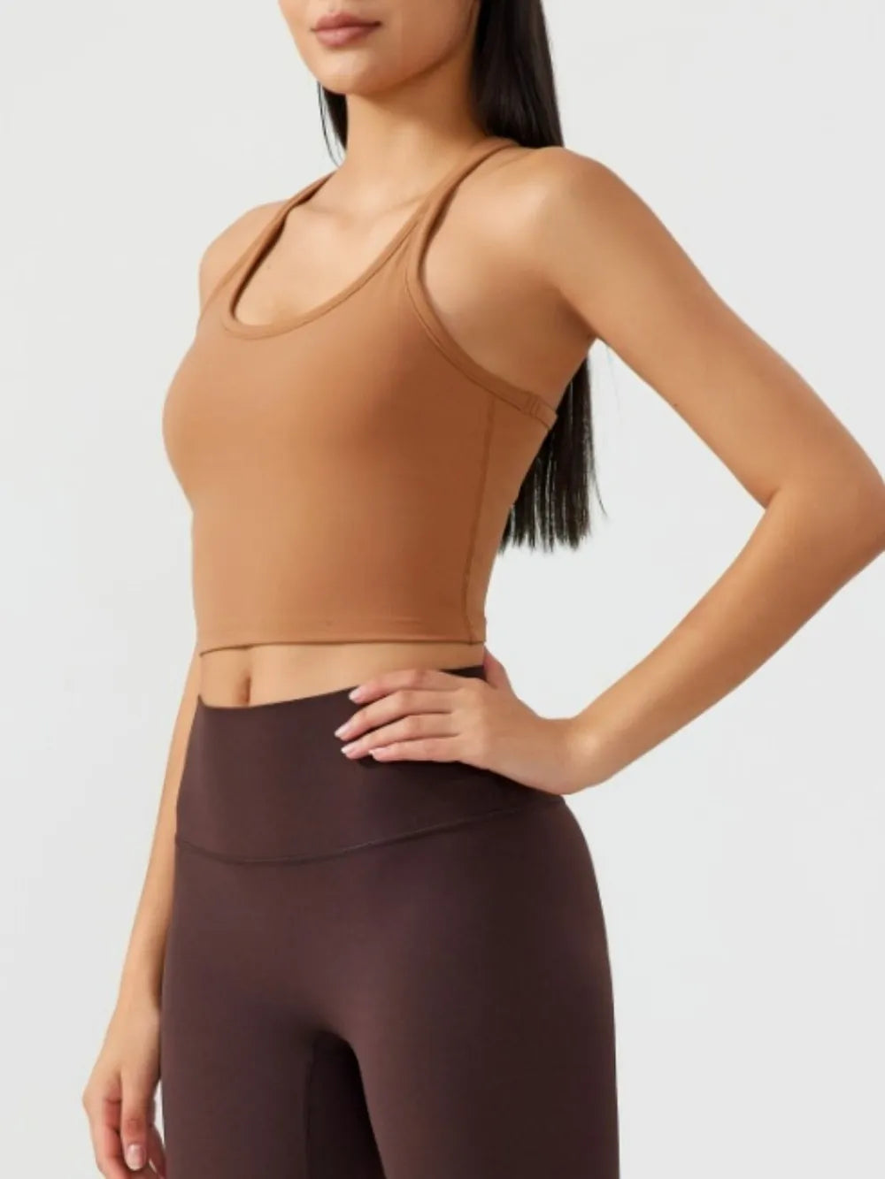 Caramel scoop neck active tank with racerback, smooth stretch fabric.