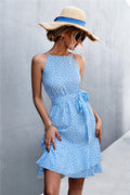 Pastel blue tie-waist sleeveless dress with white speckle print and ruffle hem